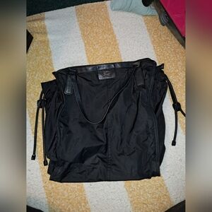 Burberry brand Women's Buckliegh tote bag with leather trim and drawstring